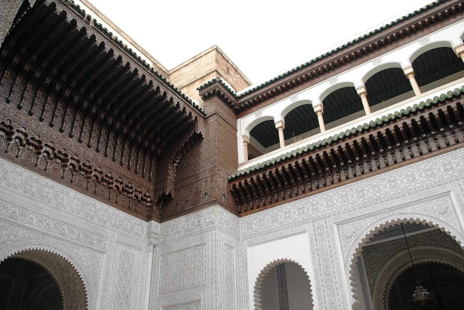 Courtyard of the Mahkama du Pacha in the Habous, with arcades and carved neo-Moorish plasterwork